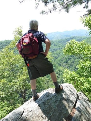 Man looking over mountains