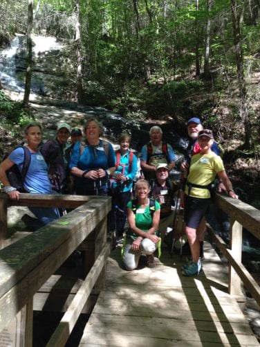 hikers at fall branch falls